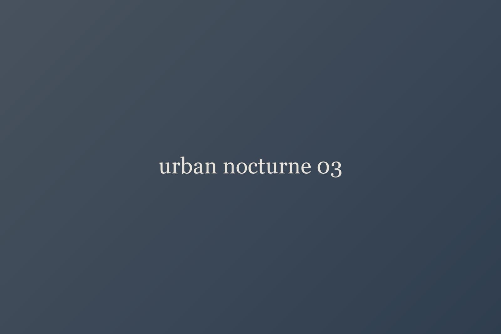 Crosswalk framed by headlights at dusk